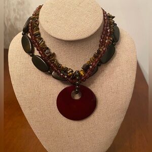 Fashion Necklace. 4 Layers Of Beads With Larger Round Pendant